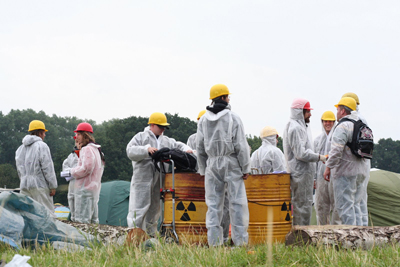 Green protesters with their "nuclear waste"