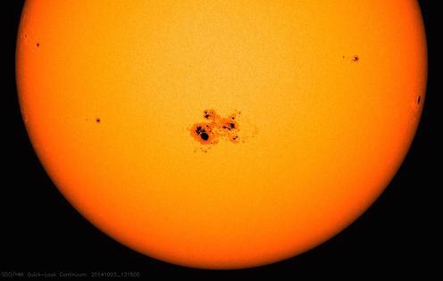 AR2192: Giant Sunspot Returns, Bigger And Badder Than Ever