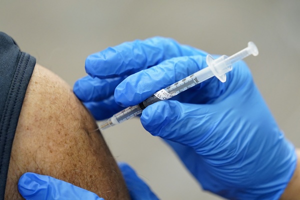 A person getting the coronavirus vaccine.