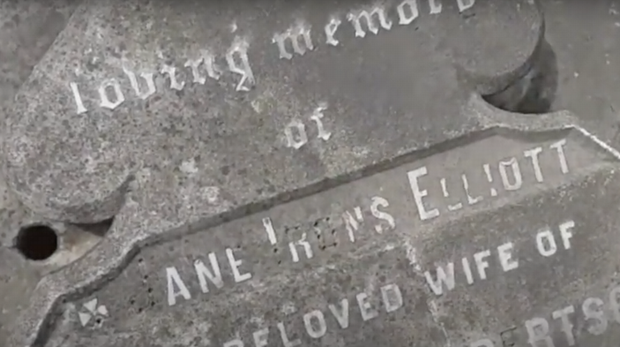 The battered gravestone of Scotswoman Jane Elliott in the Scottish cemetery in Calcutta.